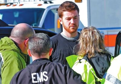 嫌犯接受詢問。新華社/美聯(lián)