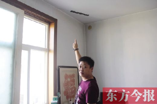 鶴壁一小區(qū)樓板斷裂數(shù)年無(wú)人管 律師稱開(kāi)發(fā)商應(yīng)根據(jù)實(shí)際損失加以賠償(圖)