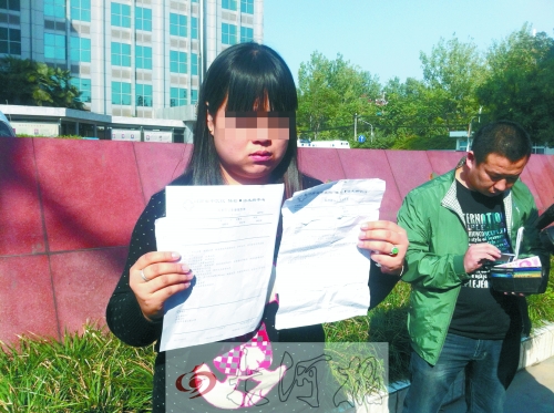 拿著兩份檢查結(jié)果完全相反的報告單,梁女士很郁悶。