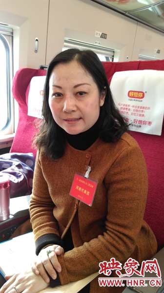 作為全國人大代表，王馨最關(guān)心的就是農(nóng)民工權(quán)益的保護(hù)問題。