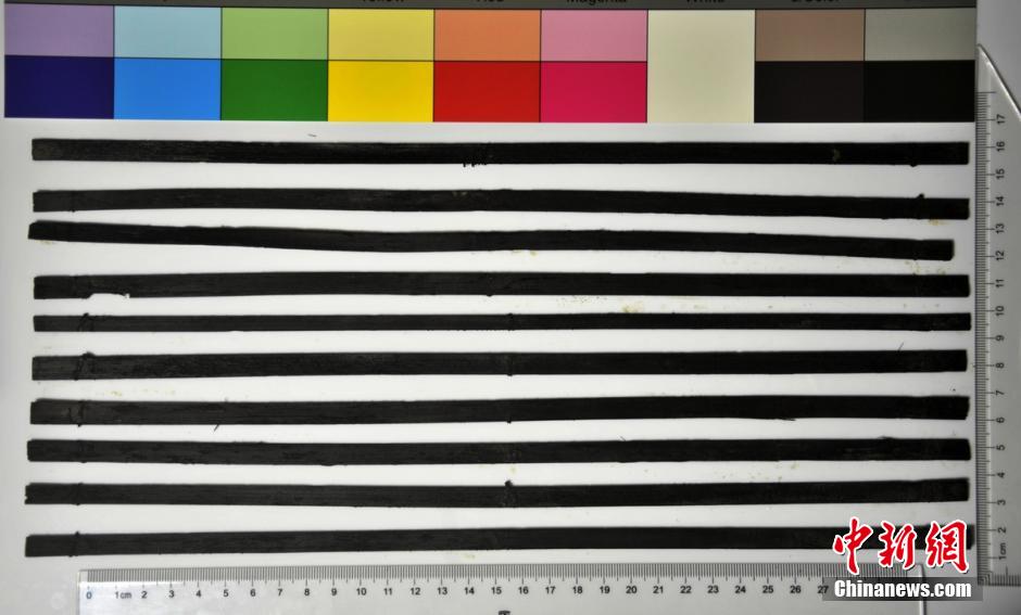 圖為漢代簡牘出土930支竹簡，在四川地區(qū)首次發(fā)現(xiàn)漢代簡牘。