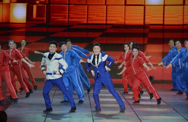 《小蘋果》、《最炫民族風(fēng)》等廣場舞曲將會有全國統(tǒng)一、編排科學(xué)、帶給人正能量的全新動作。 CFP 資料