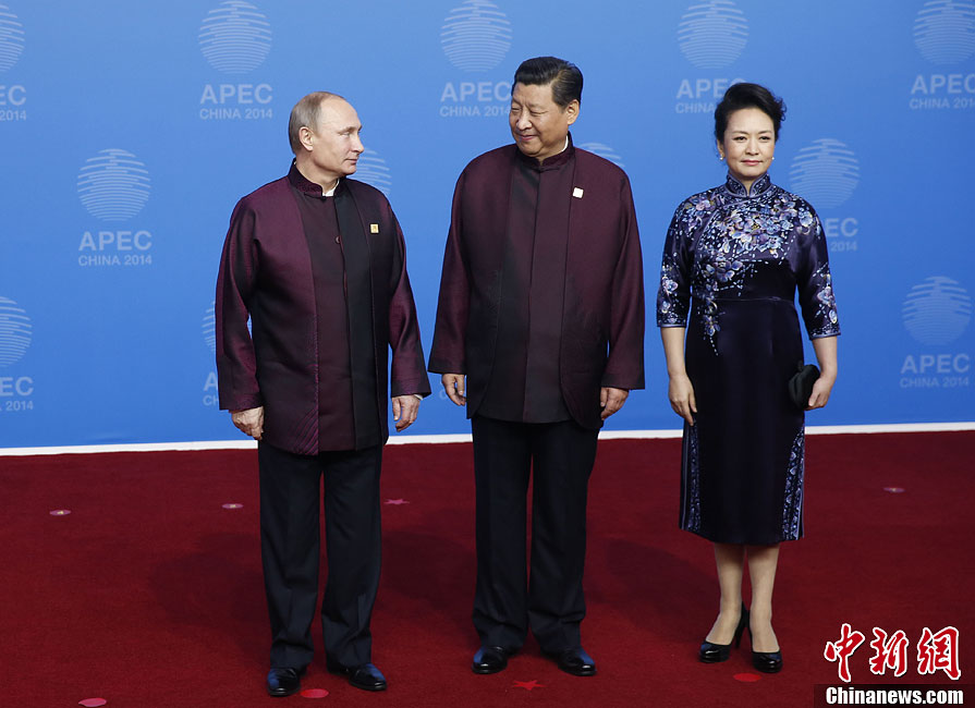 圖為習(xí)近平夫婦歡迎俄羅斯總統(tǒng)普京。中新社發(fā) 杜洋 攝