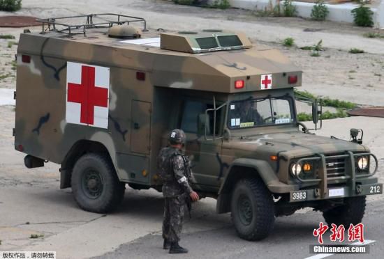 資料圖：當(dāng)?shù)貢r間2014年6月23日，韓國江原道哨所槍擊事件肇事士兵林某已被抓獲