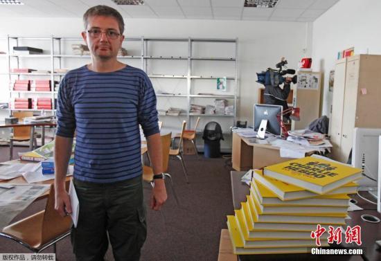 圖為昔日法國(guó)《查理周刊》雜志社總部?jī)?nèi)景。