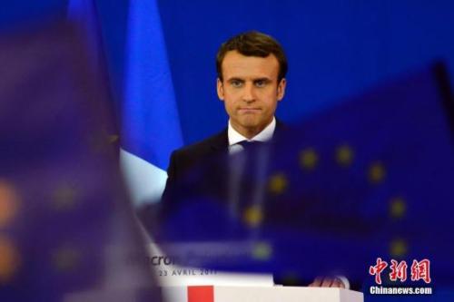 圖為馬克龍?jiān)趹c祝集會上。中新社記者 龍劍武 攝