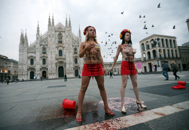 烏女權(quán)主義者半裸鬧場亞歐峰會(huì) “潑血”抗議普京